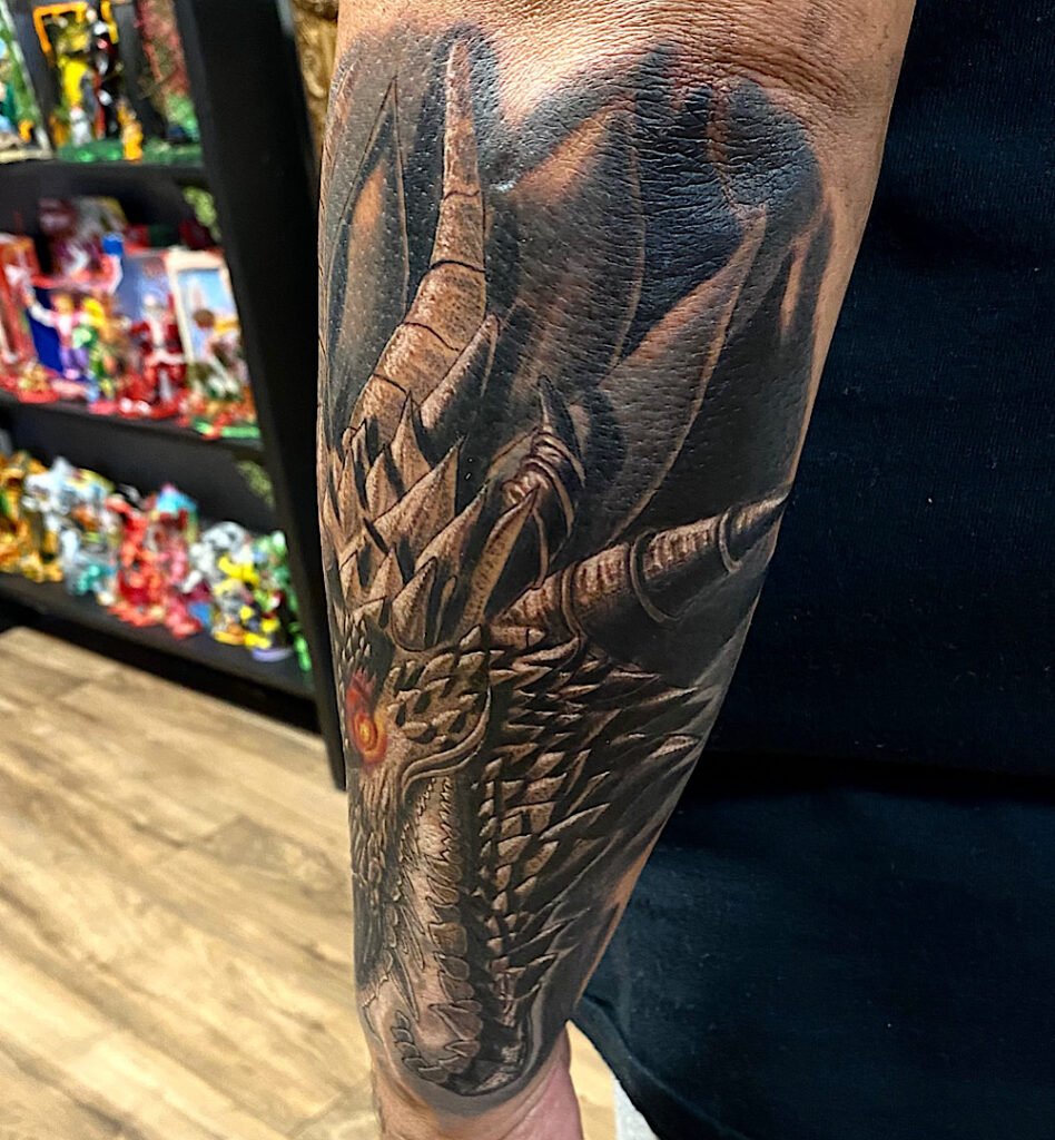 alt="Black & grey realism sleeve tattoo by Omar Barron, luxury custom tattoo Idaho"