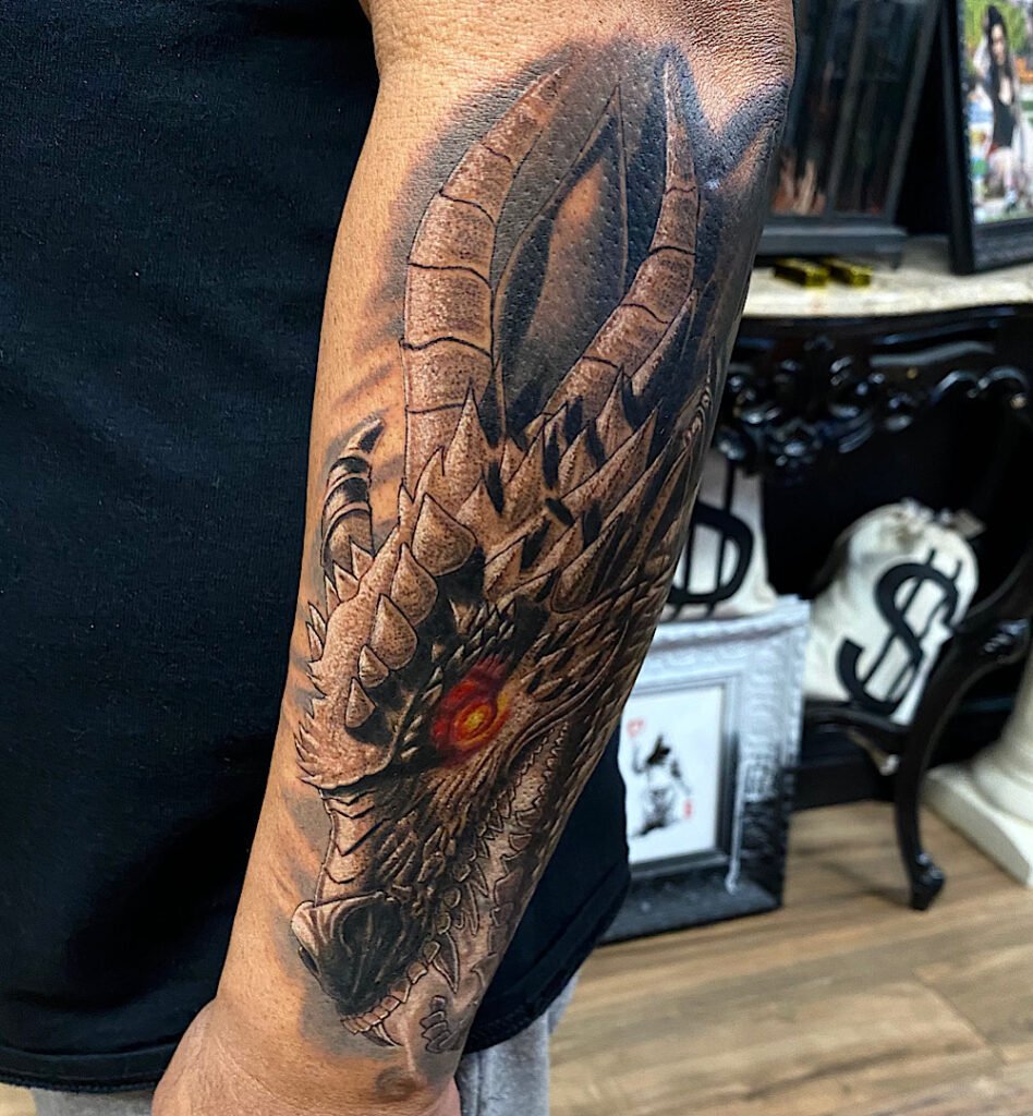 alt="Black & grey realism sleeve tattoo by Omar Barron, luxury custom tattoo Idaho"