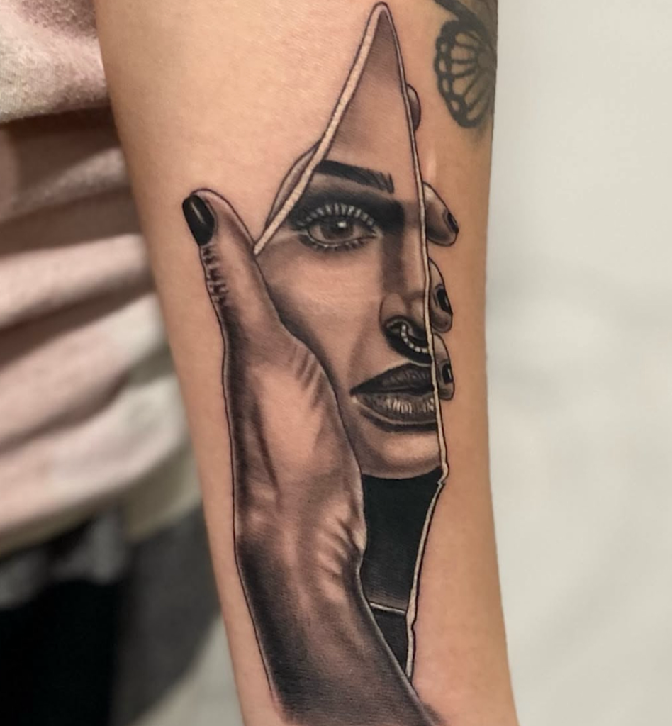 alt="Black & grey realism sleeve tattoo by Omar Barron, luxury custom tattoo Idaho"