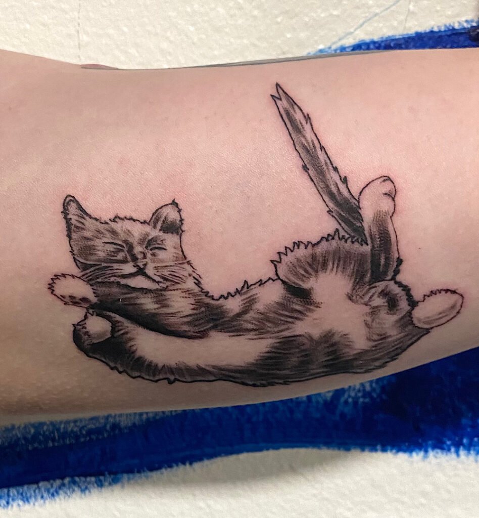alt="Black & grey realism cat tattoo by Omar Barron, luxury custom tattoo Idaho"