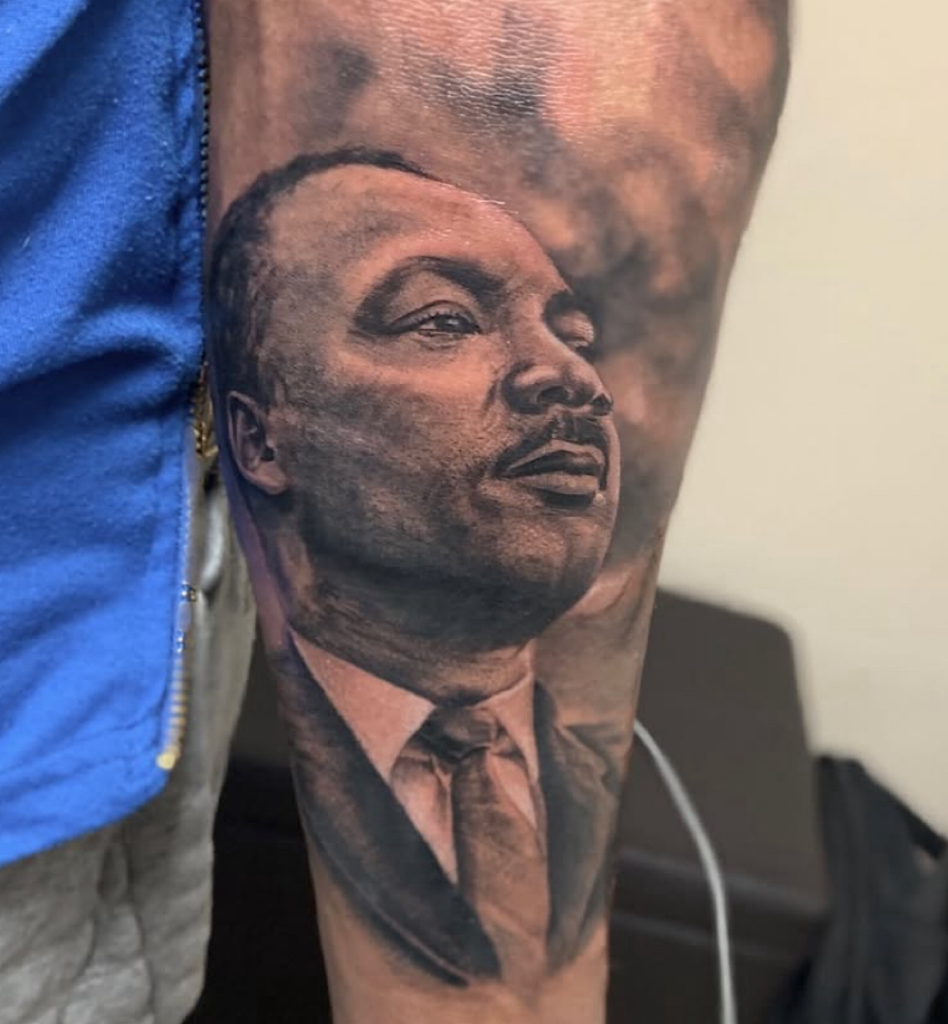 alt="Black & grey realism portrait tattoo by Omar Barron, luxury custom tattoo Idaho"