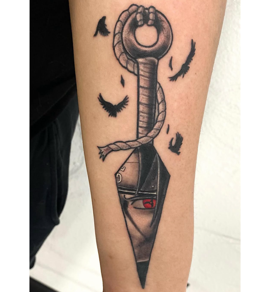 alt="Black & grey realism anime tattoo by Omar Barron, luxury custom tattoo Idaho"