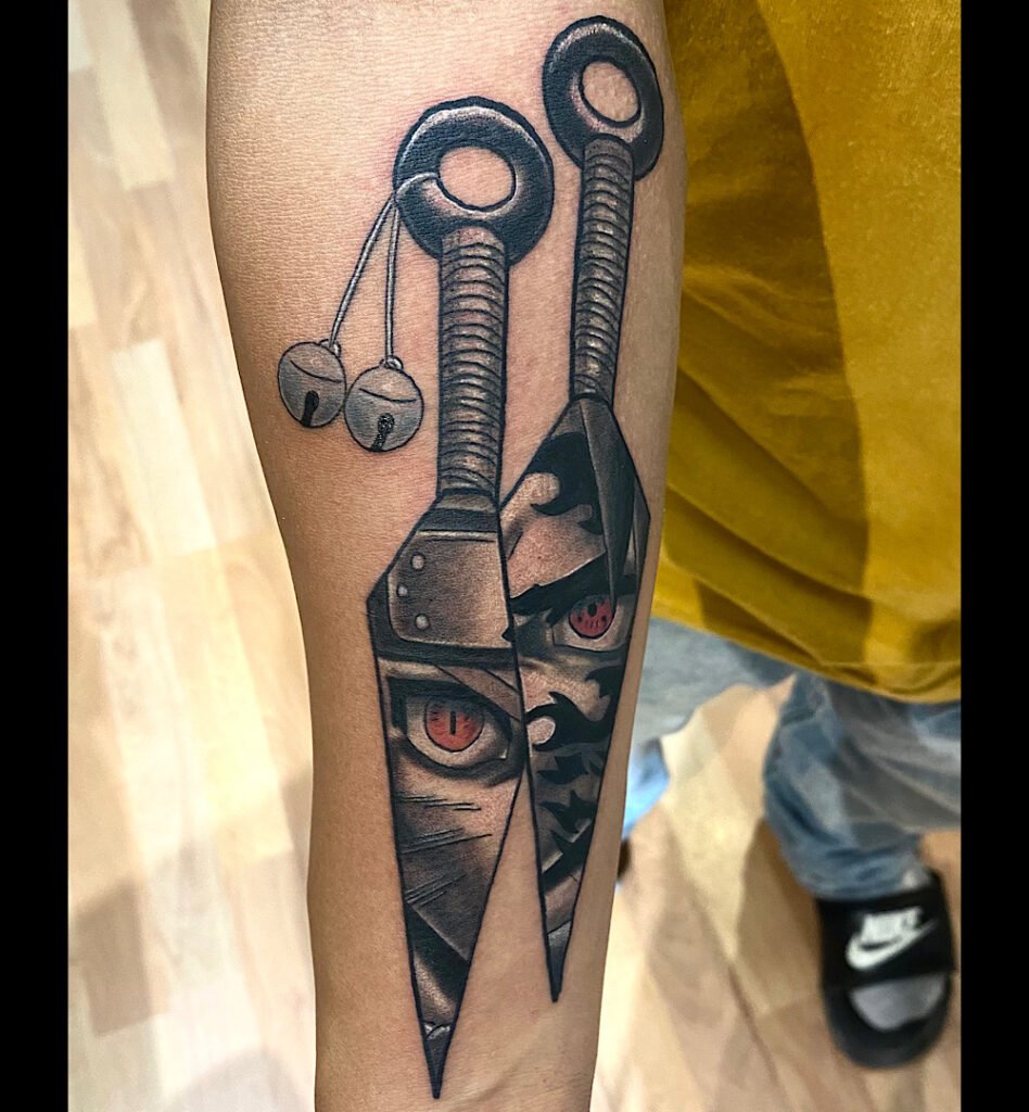 alt="Black & grey realism anime tattoo by Omar Barron, luxury custom tattoo Idaho"