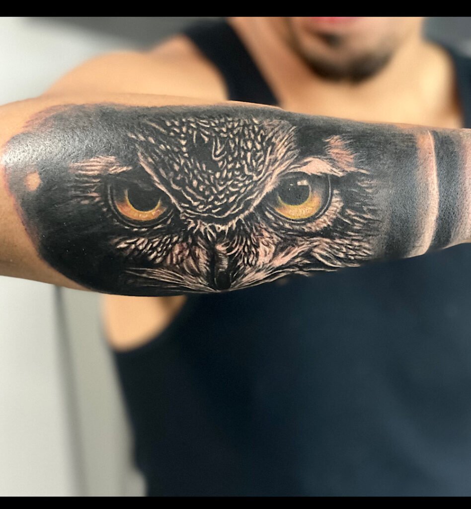 alt="Black & grey realism owl tattoo by Omar Barron, luxury custom tattoo Idaho"