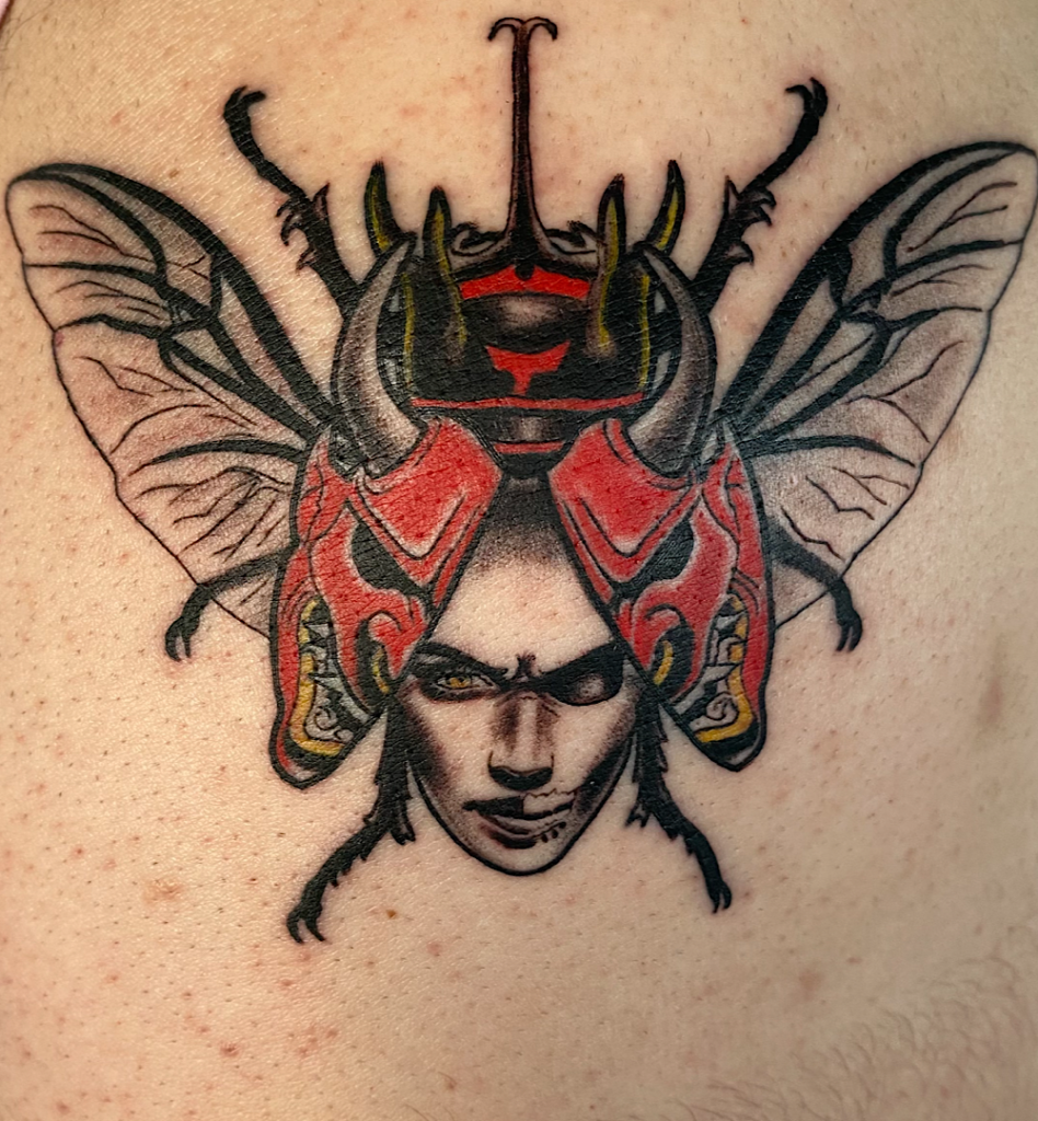 alt="Black & grey realism sleeve tattoo by Omar Barron, luxury custom tattoo Idaho"