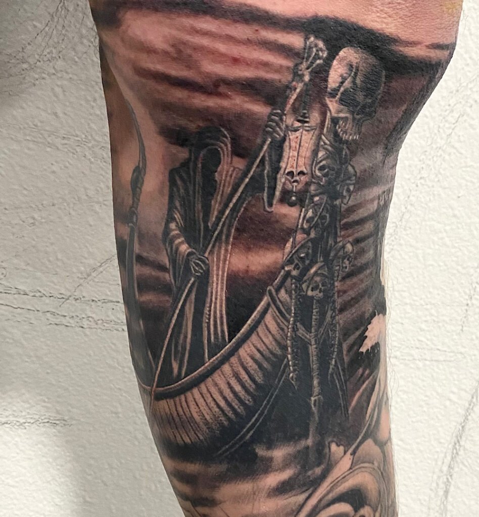 alt="Black & grey realism death tattoo by Omar Barron, luxury custom tattoo Idaho"