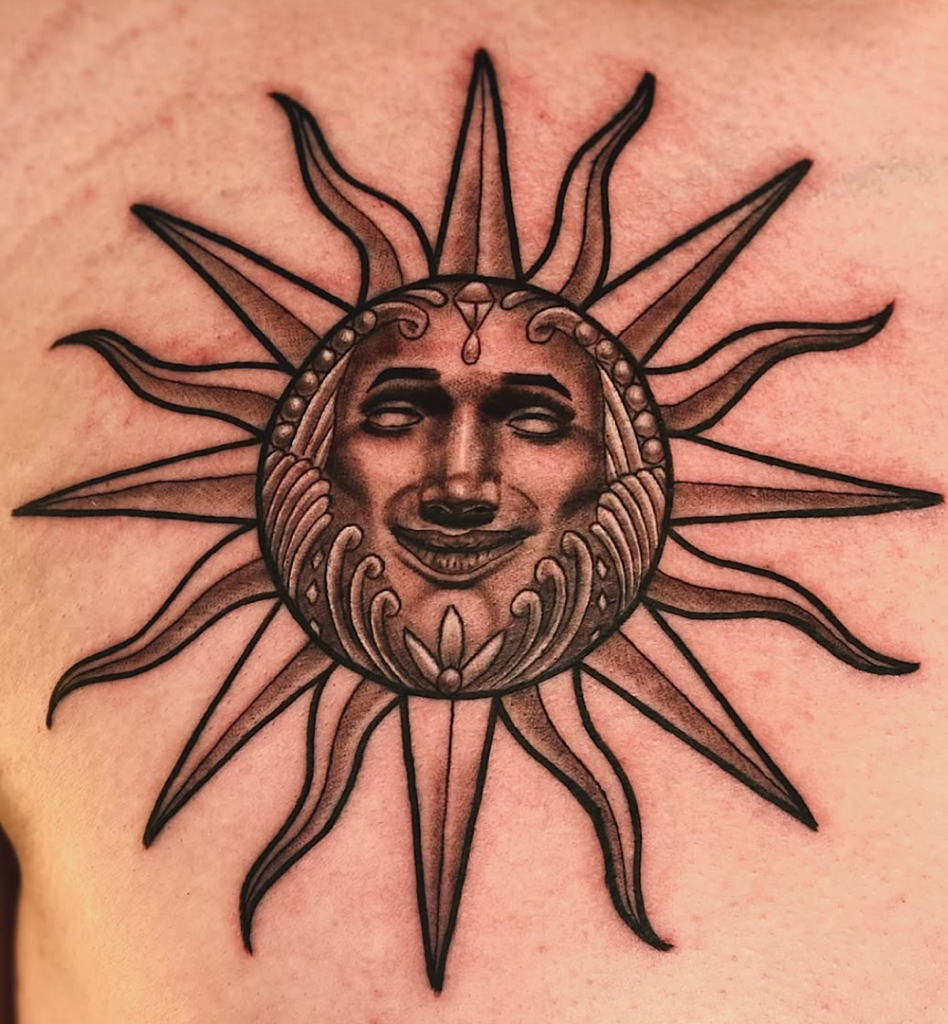 alt="Black & grey realism sleeve tattoo by Omar Barron, luxury custom tattoo Idaho"